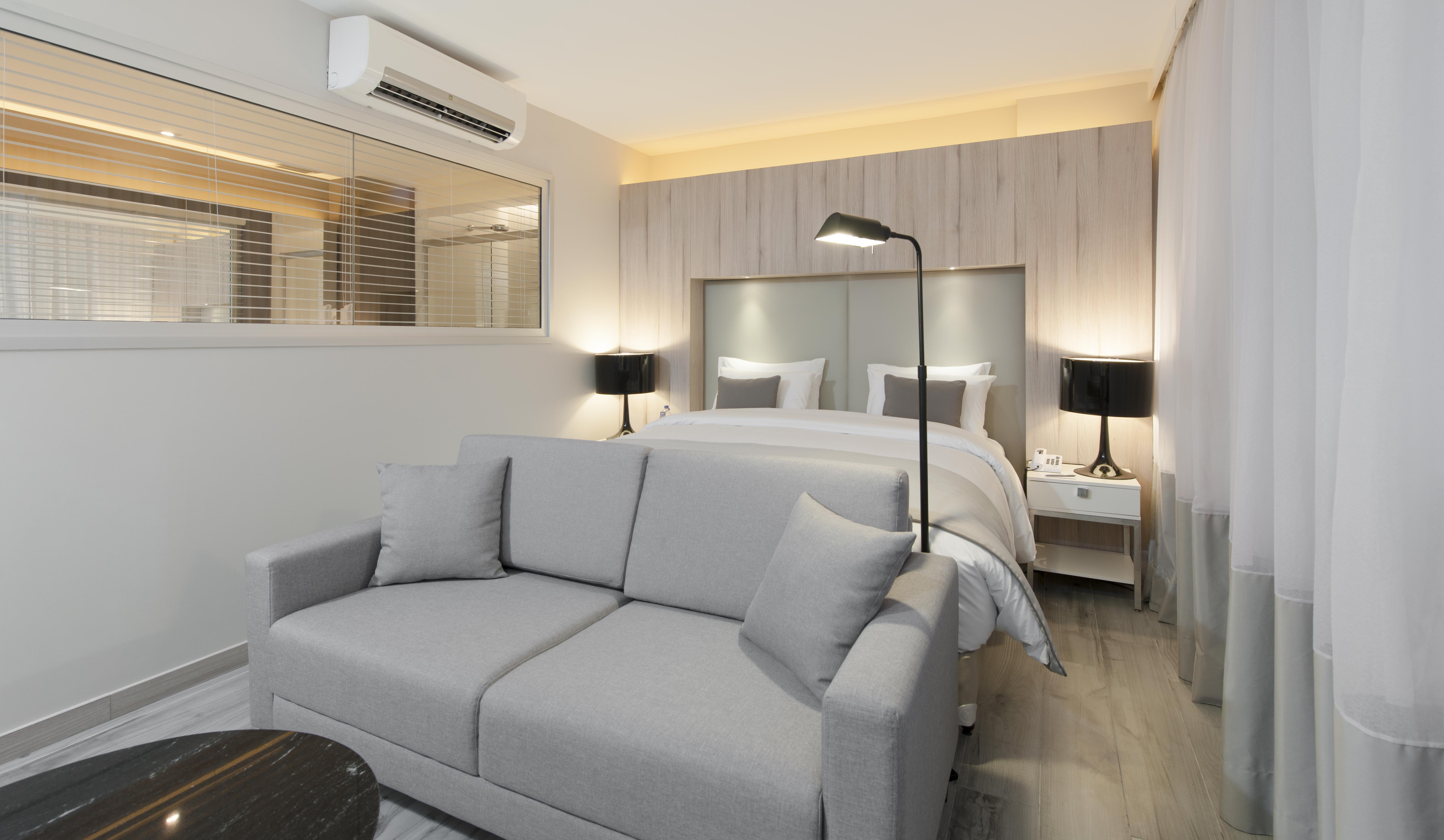 מלון Radisson Blu Belo Horizonte Savassi מראה חיצוני תמונה A bedroom in a serviced apartment in Hong Kong